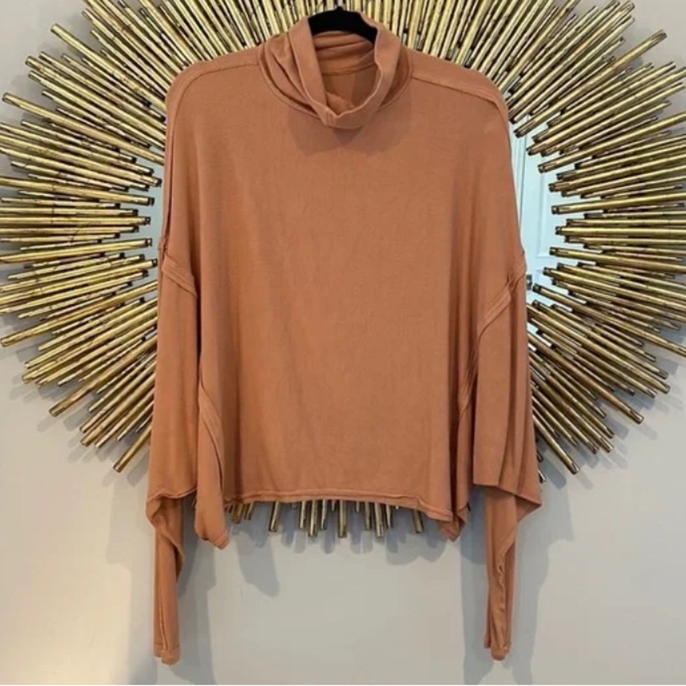 We The Free, turtle neck long sleeve, with box cut making it loose and flowy